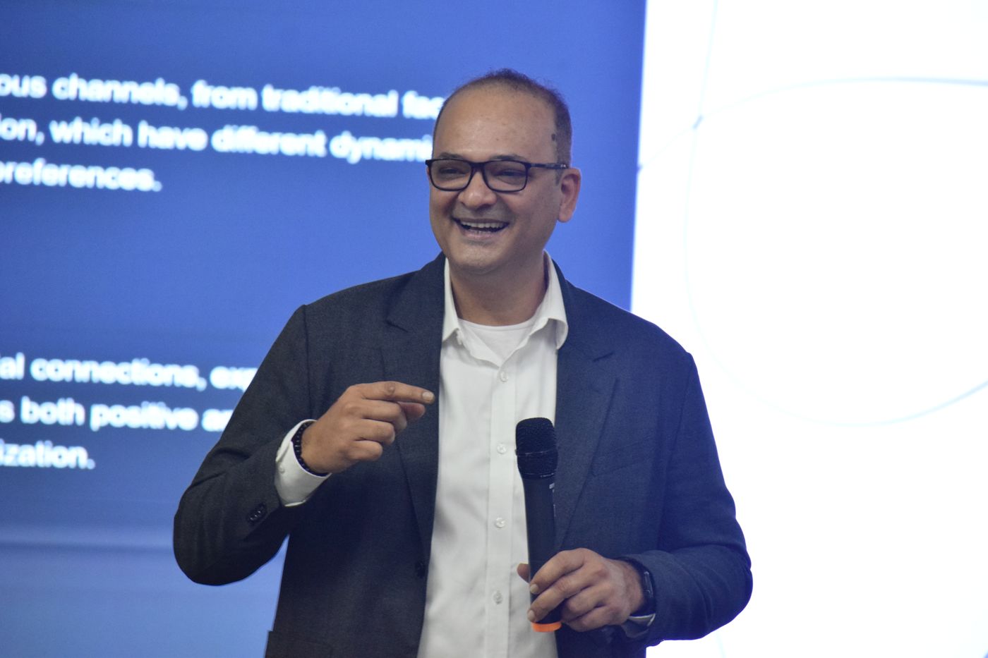 Dr. Vivek S. delivering a keynote on leadership psychology