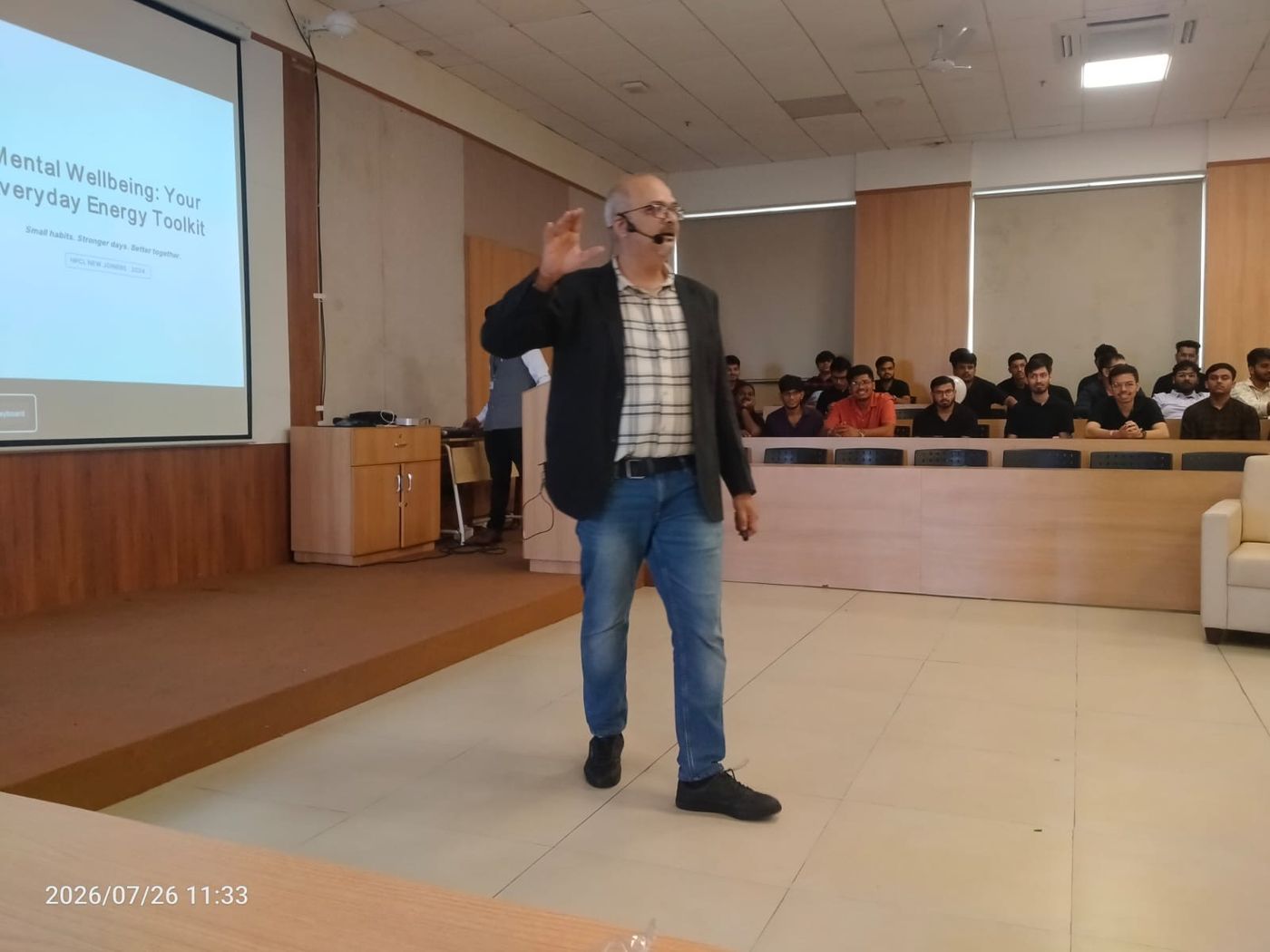 Dr. Vivek S. speaking to a training group
